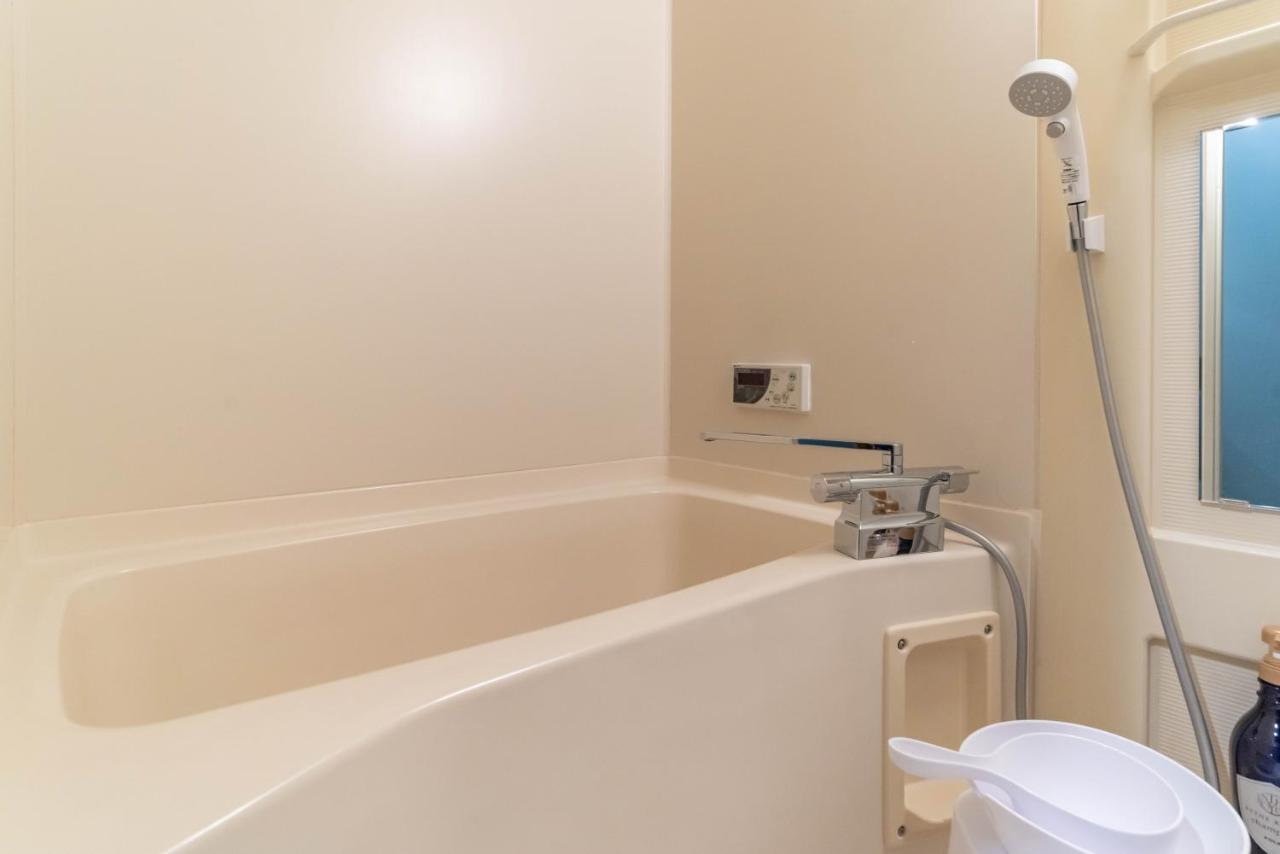 Design House Ao Apartment Osaka Bagian luar foto