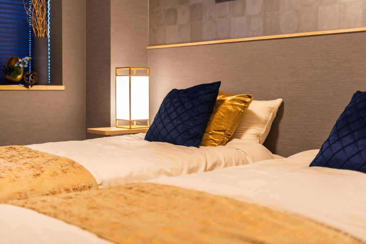 Design House Ao Apartment Osaka Bagian luar foto