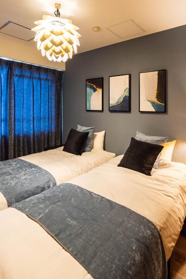 Design House Ao Apartment Osaka Bagian luar foto